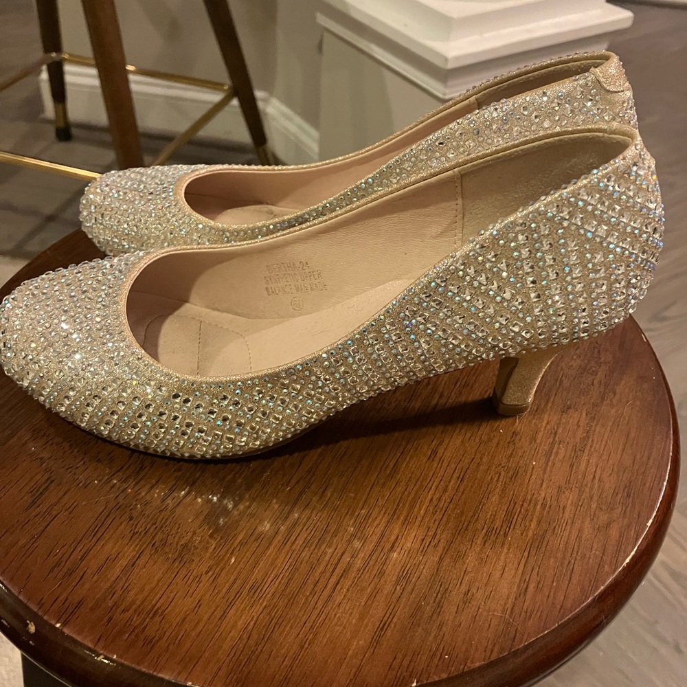 Glitter shoes worn outside TWICE. Size 6.5 with approximately a 2-inch heel.